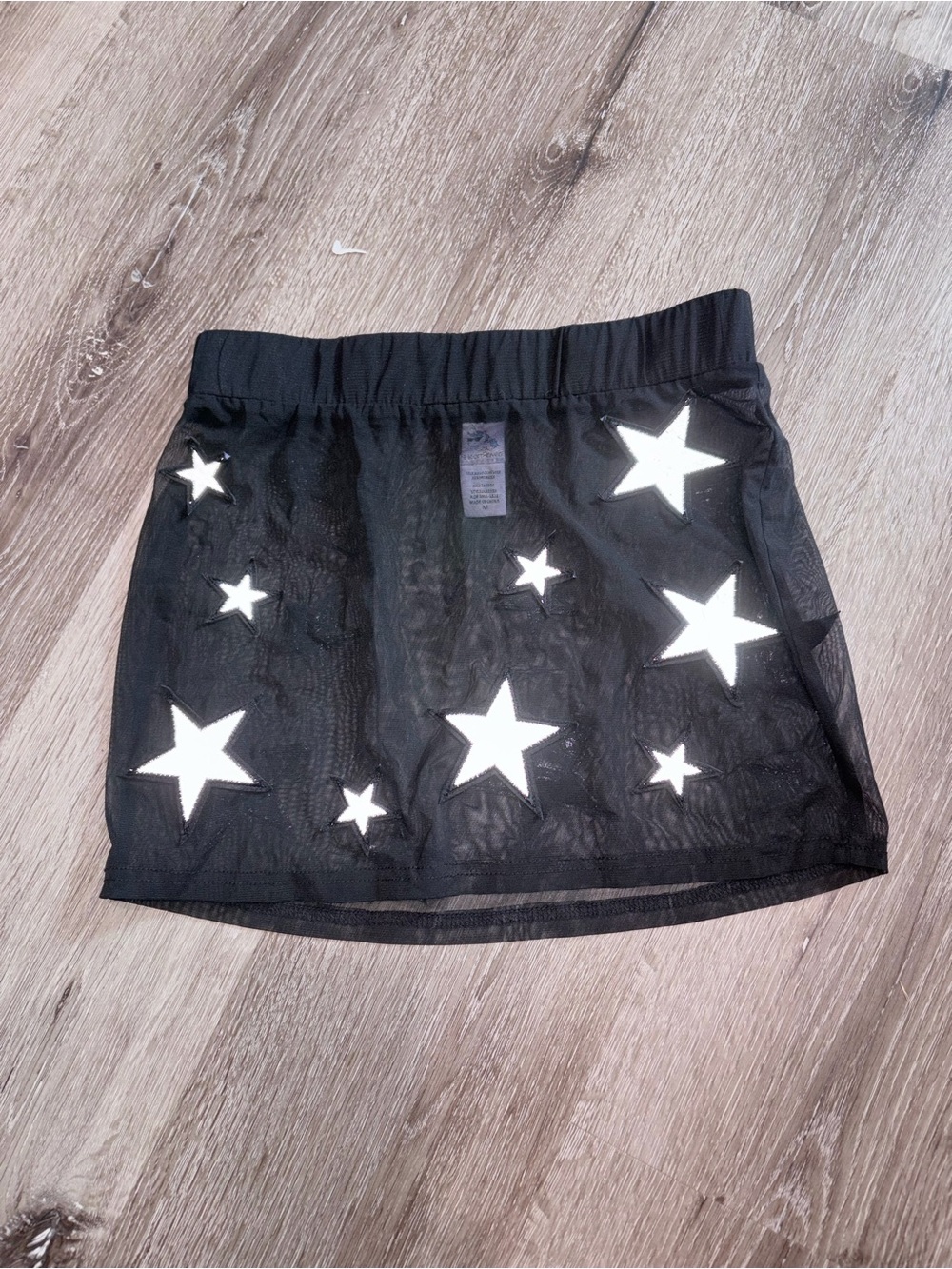 Black Mesh Mini Skirt with reflective Star Accents